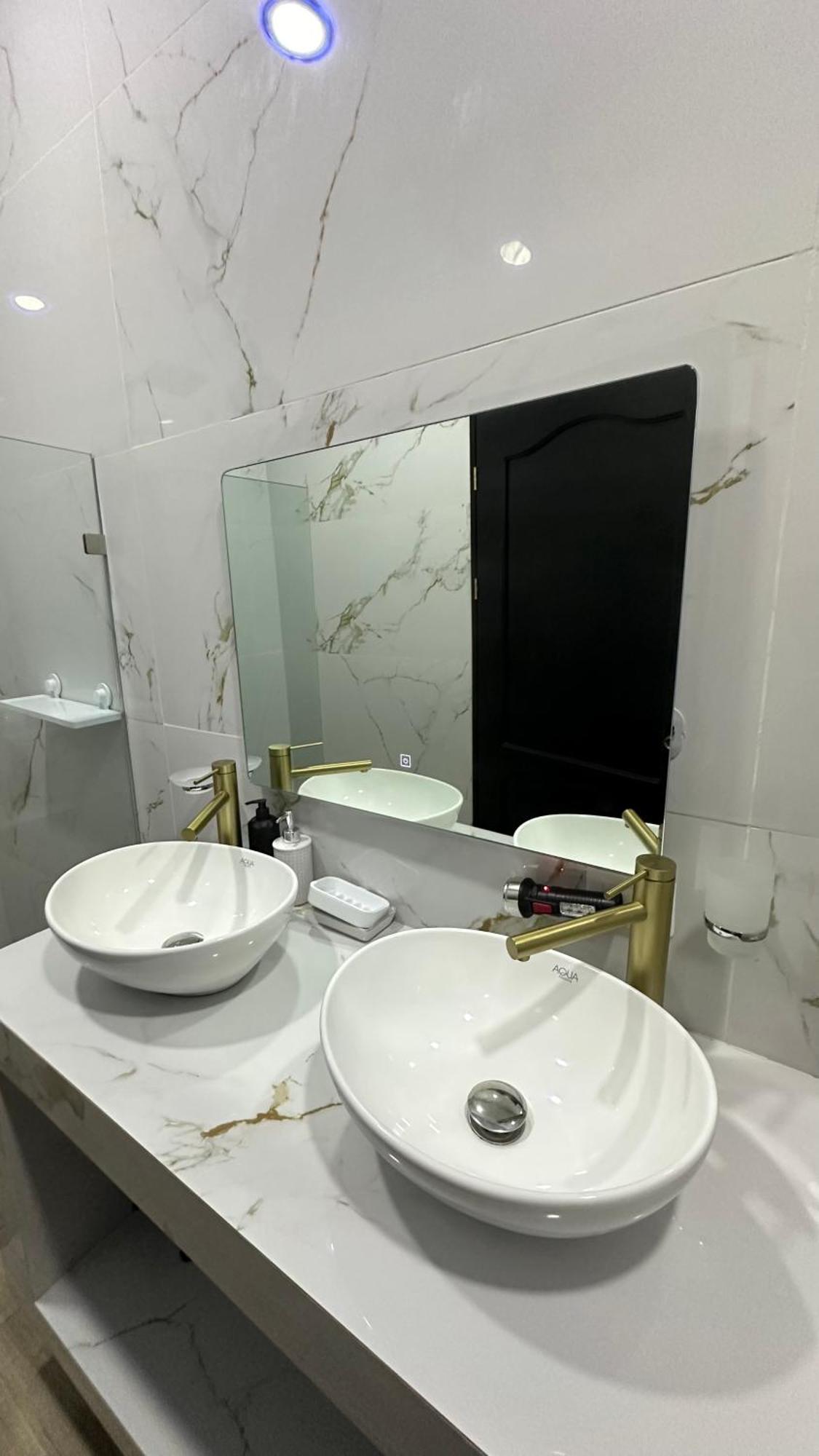 H Et L Apartment ตอร์ตูเกโร ภายนอก รูปภาพ